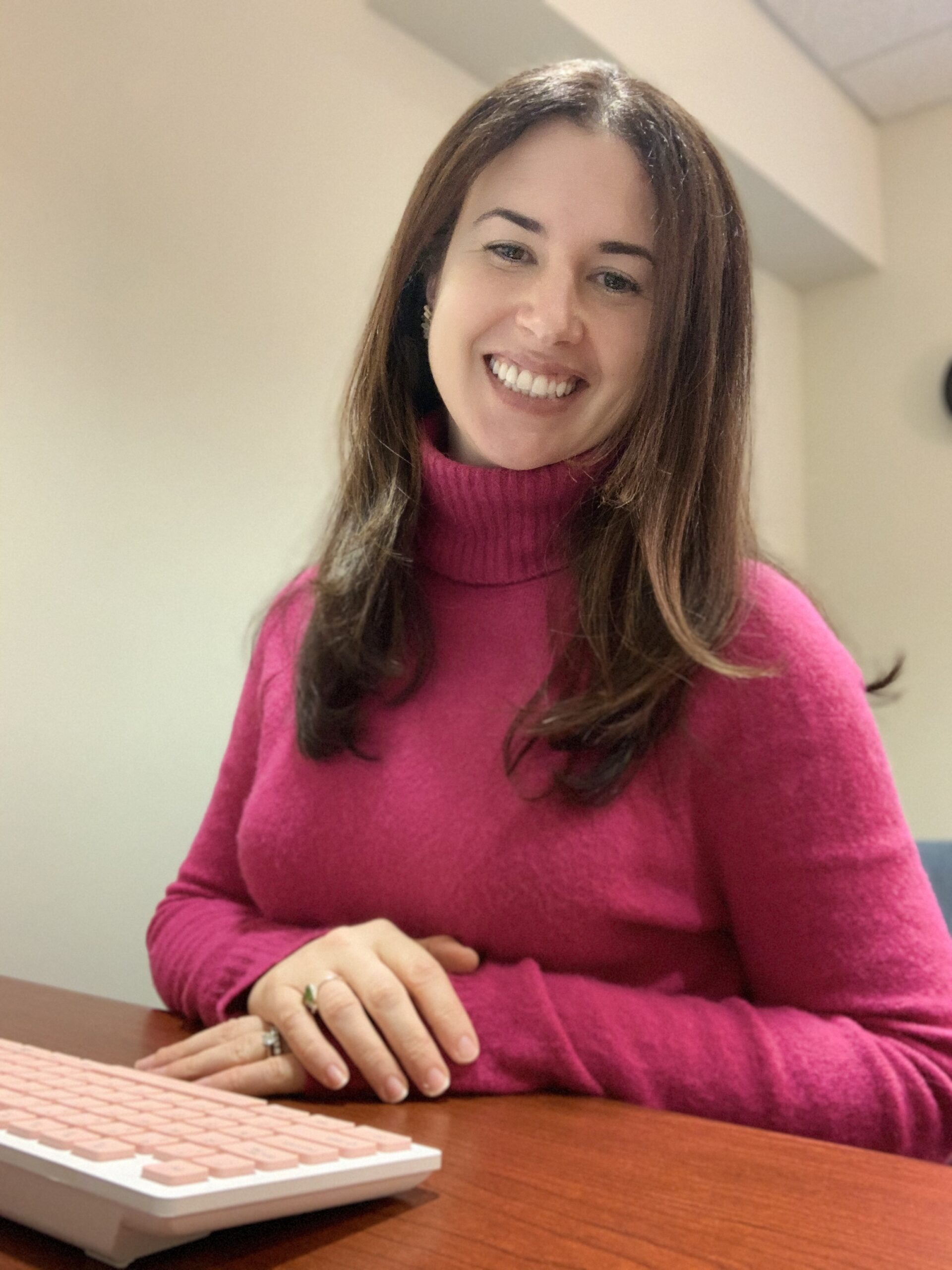 image of Carolyn at desk